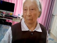 Old Asian Grandmother Gets Comfortless